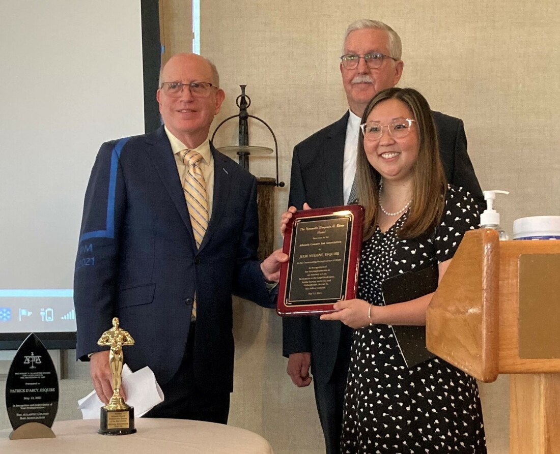 (L-R: Douglas S. Stanger, the Honorable William E. Nugent & his daughter, Julie E. Nugent, Esq.)