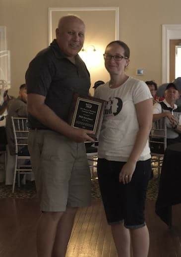 Phil Kirchner accepting the award given by Maura Schwartz, Mary Sherlach's daughter  